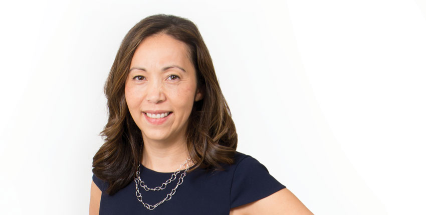 A headshot of Marcia Haigis against a white background