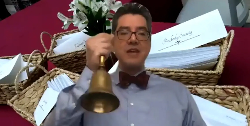 screengrab of dean saldana ringing bell from video