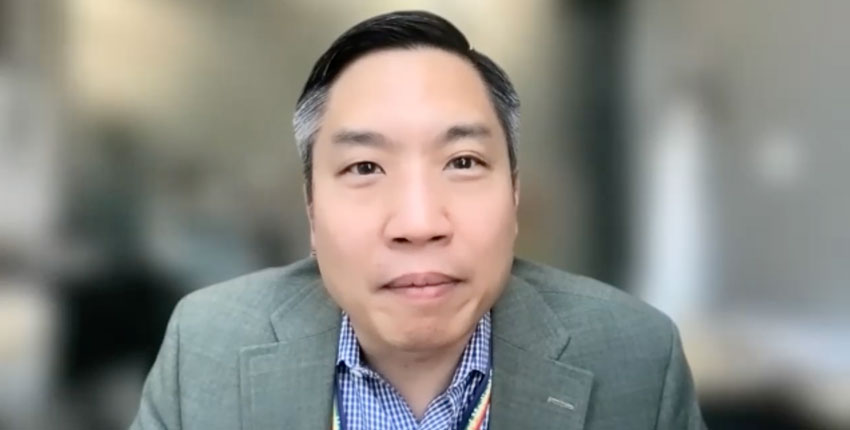 Chang in video smiling at onscreen camera