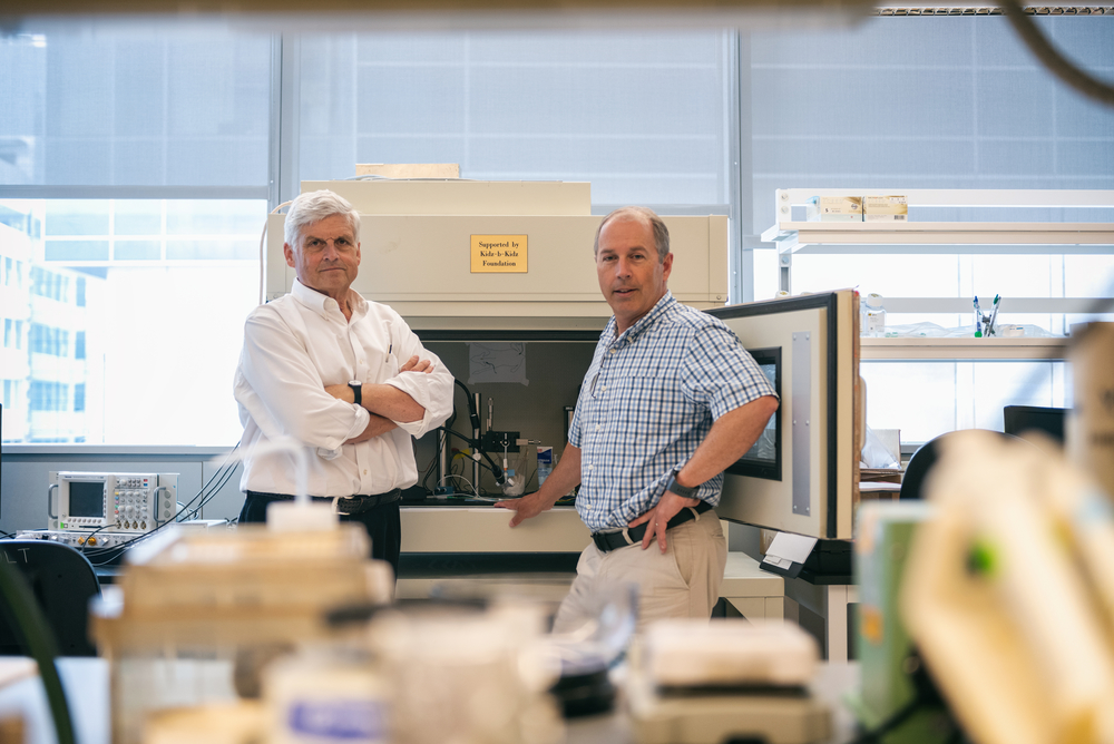 two researchers in the lab