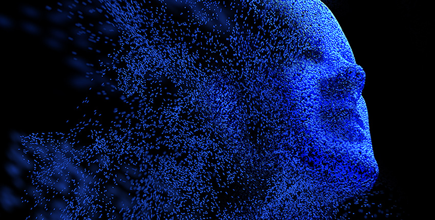 Abstract image of human face in blue dissolving