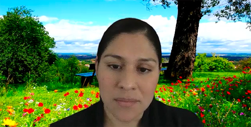 screen grab of video showing morales-temich against a field of flowers and blue sky