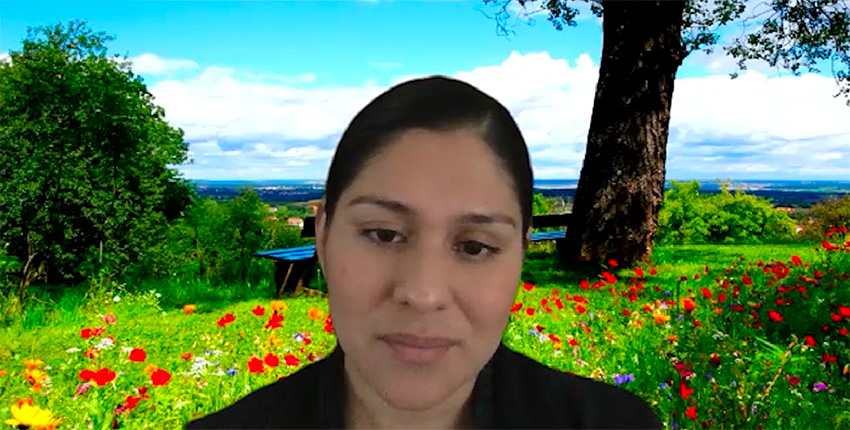 screen grab of video showing morales-temich against a field of flowers and blue sky