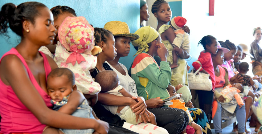 Women and children waiting for vaccinations.