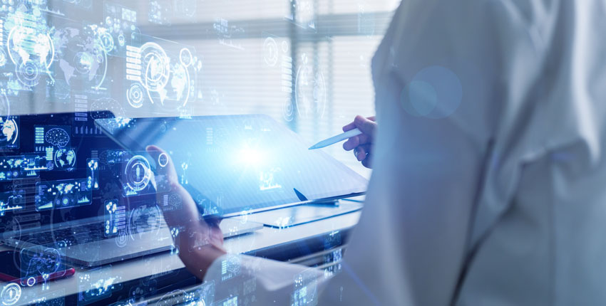 Scientist in white coat holding a table with science concept images overlaid