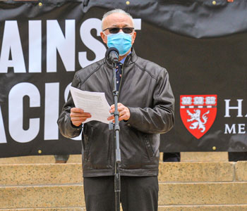 Dean Daley speaking at Stand Against Racism rally on Apr. 22 
