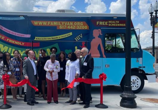 Family Van ribbon cutting