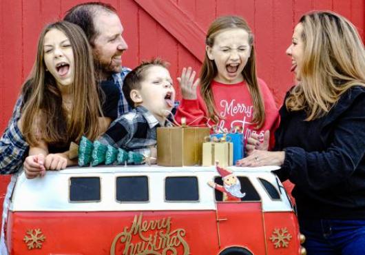 Holiday family photo of Randy Fox with his wife and kids