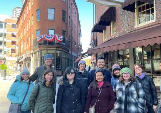 Victoria Nguyen with a group of people in downtown Boston