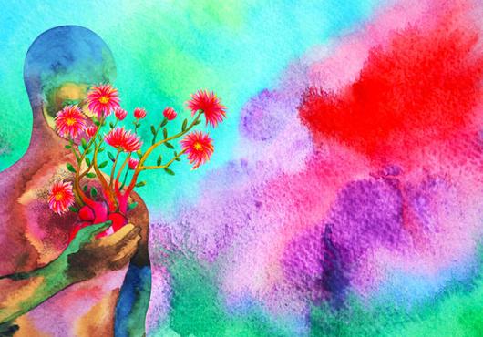 Abstract and colorful representation of a human silhouette holding flowers