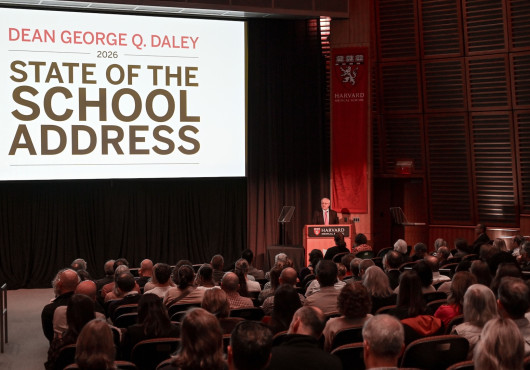 George Q. Daley addresses a seated crowd during his 2026 State of the School address