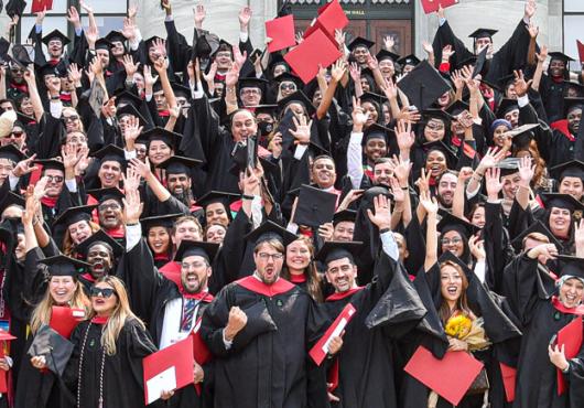 Graduates gathered for a celebratory photo after receiving their diplomas