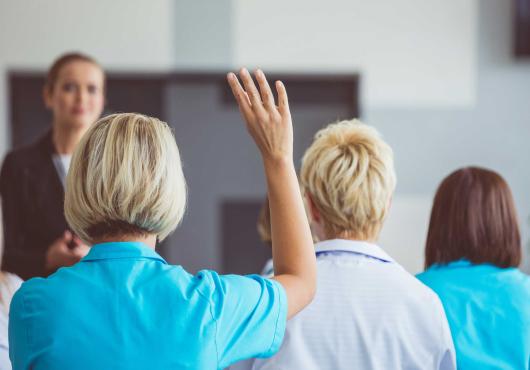 Health care workers in a classroom 