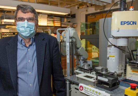 Photo of Mark Namchuk standing in a lab 