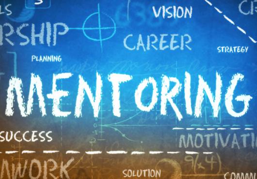 Illustration that says "Mentoring" on a chalk board 