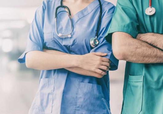 Stock photo of nurses in scrubs, no faces shown