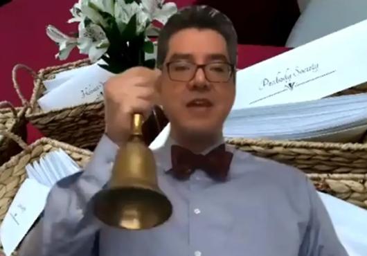 screengrab of dean saldana ringing bell from video