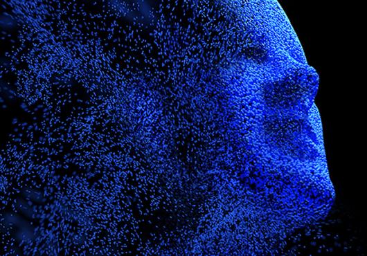 Abstract image of human face in blue dissolving