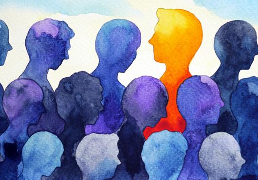 Artistic rendering a person standing out from the crowd
