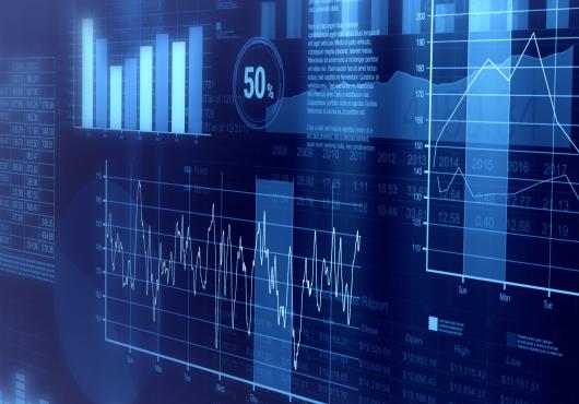 Graphs and charts overlapping onscreen in a digital collage