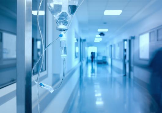 Hospital hallway with IV drip.