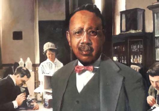 The portrait of Hinton in a lab 