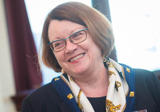 woman with brown hair smiling