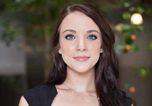 Head shot of young woman with brown hair