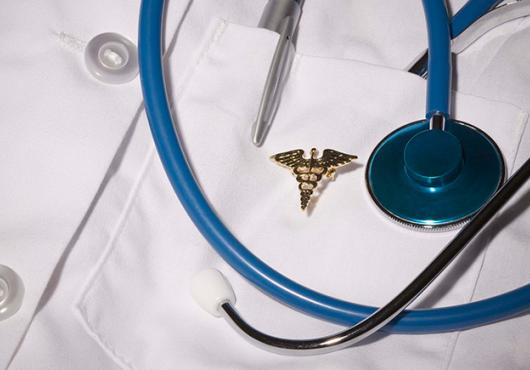 photo of white coat with stethoscope