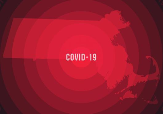 A map of Massachusetts in red labeled COVID-19