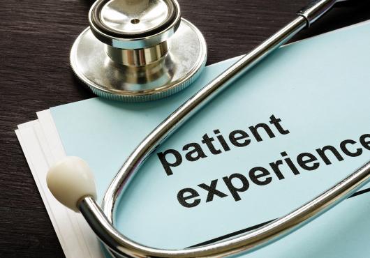 A stethoscope and a patient experience survey