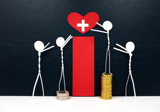 Stick figure reaching for a red heart shape with cross cutout while stepping on stack of coins