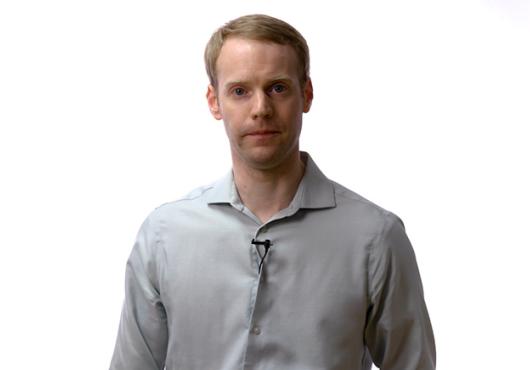 Blond man in a button-down shirt