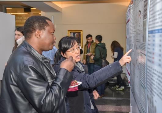 Student explaining her research during 2019 Soma Weiss Day