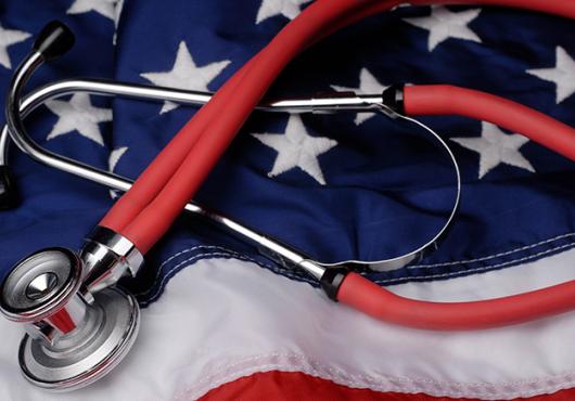 Red stethoscope on American flag
