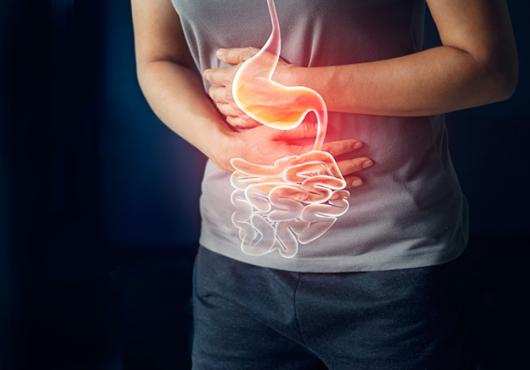 person holding their stomach