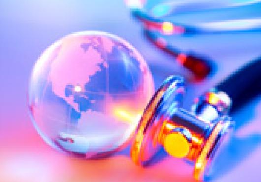 colorful photo of clear globe and stethoscope