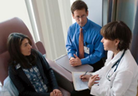 A doctor talks to a patient
