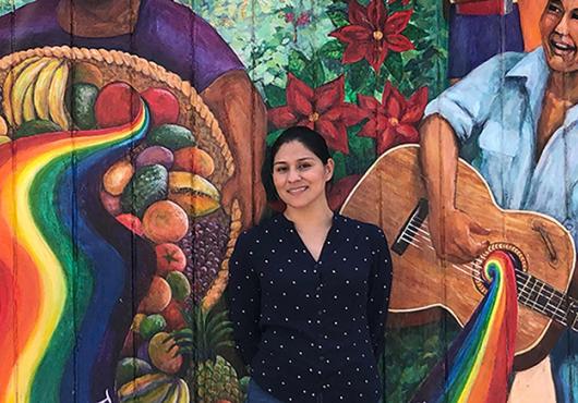photo of morales temich with mural