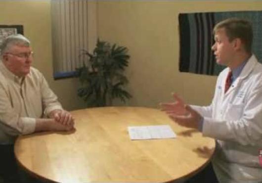 A doctor talks to a patient
