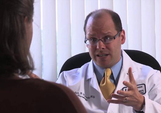A doctor talks to a patient