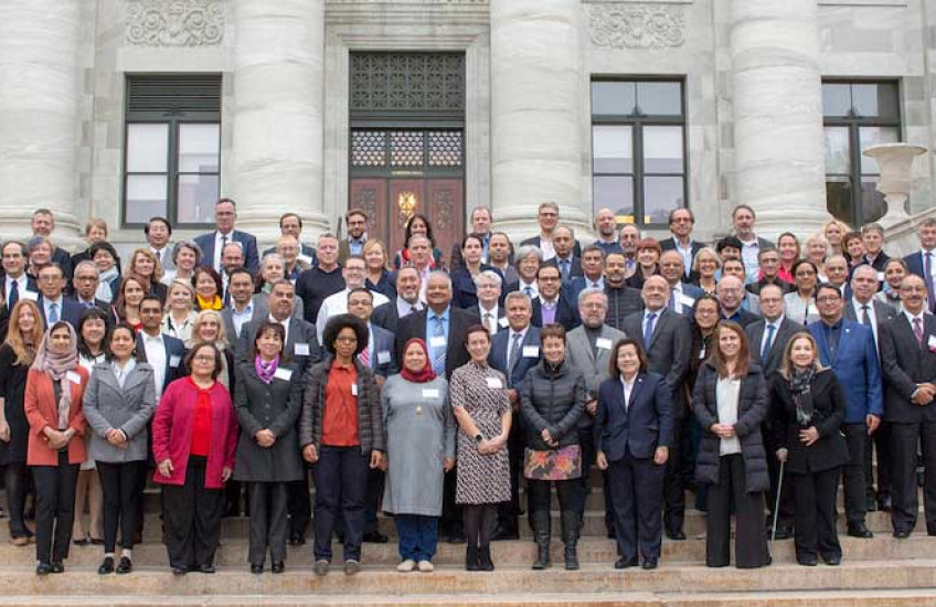 Attendees to the 2019 IMPACT symposium in front of Gordon Hall 