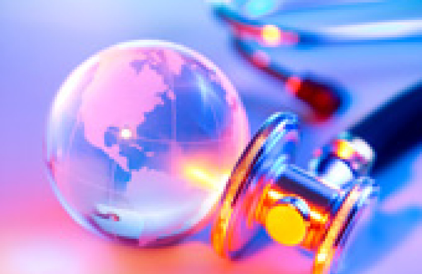 colorful photo of clear globe and stethoscope
