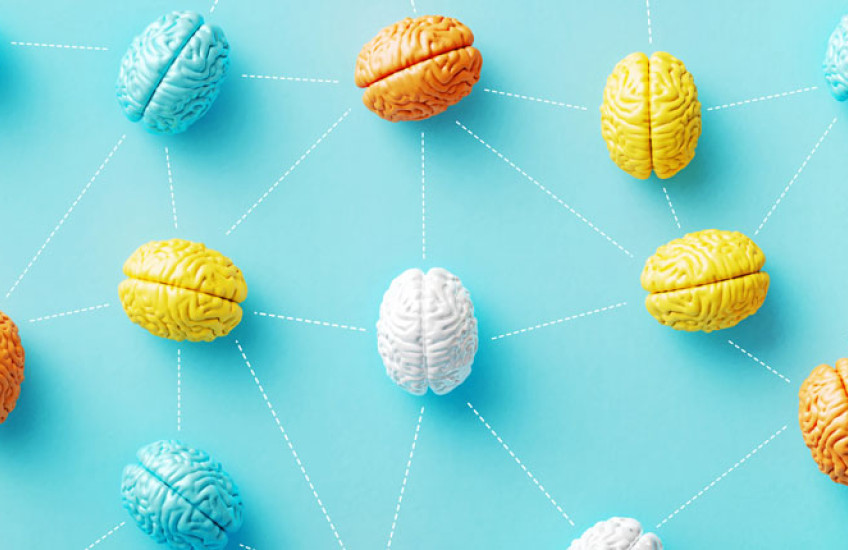 Many multicolored, stylized brains connected by dotted lines