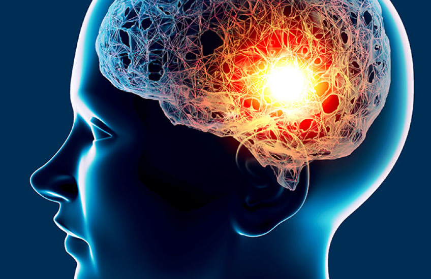 Digital illustration of human head in profile, with the brain illuminated