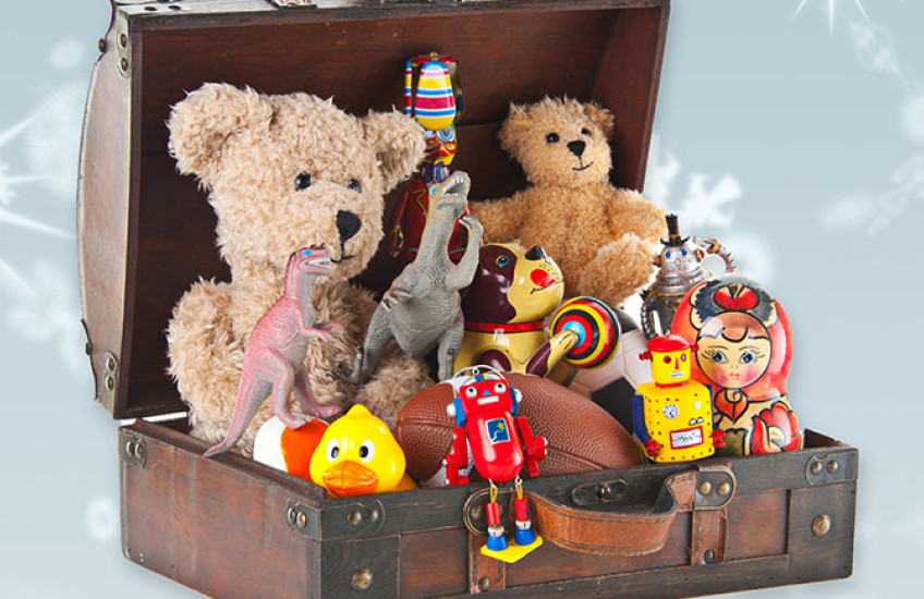 Wooden chest filled with children's toys