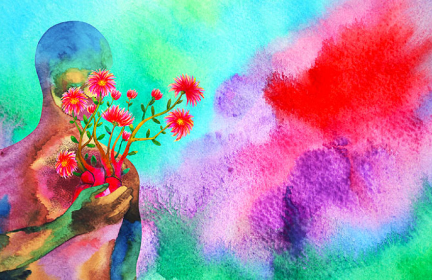 Abstract and colorful representation of a human silhouette holding flowers