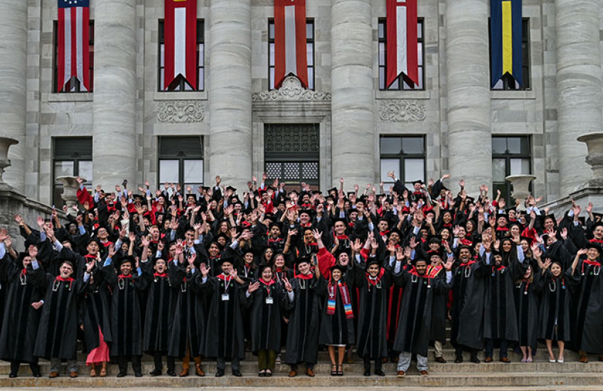 The entire medical and dental school class on the steps of a marble building.