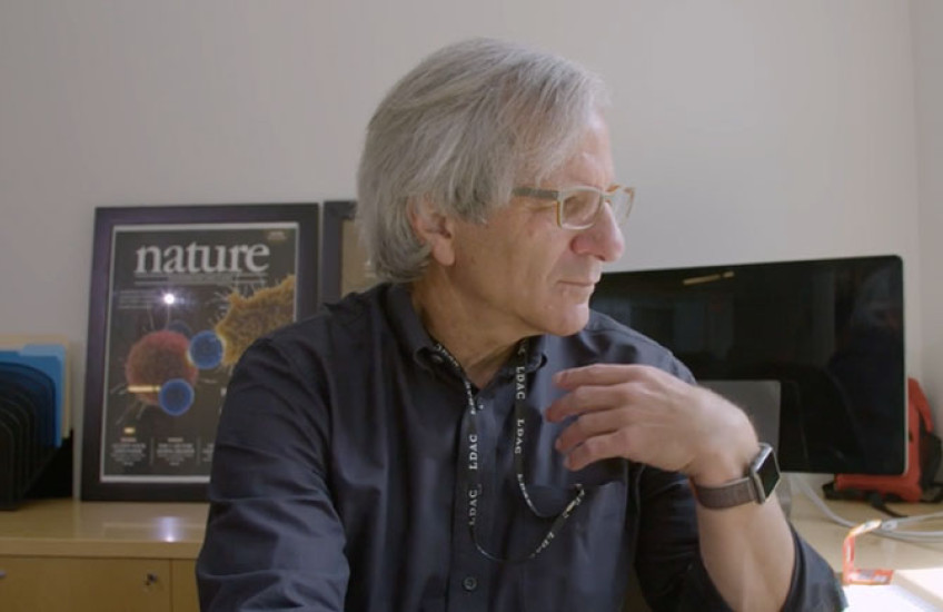 A man sitting at a computer