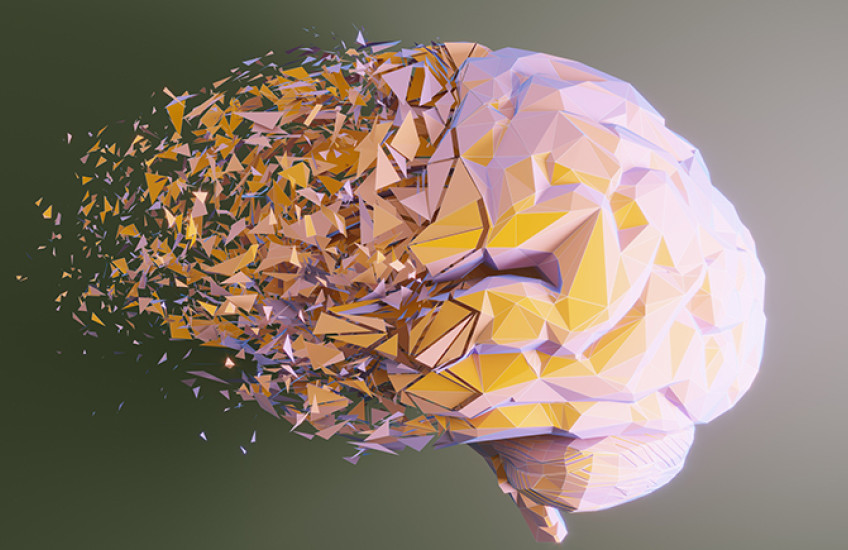 Artistic rendition of a brain with a mosaic-textured surface breaking apart in the front